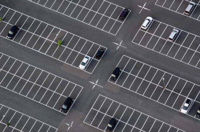 Aerial Of Mostly Empty Parking Lot